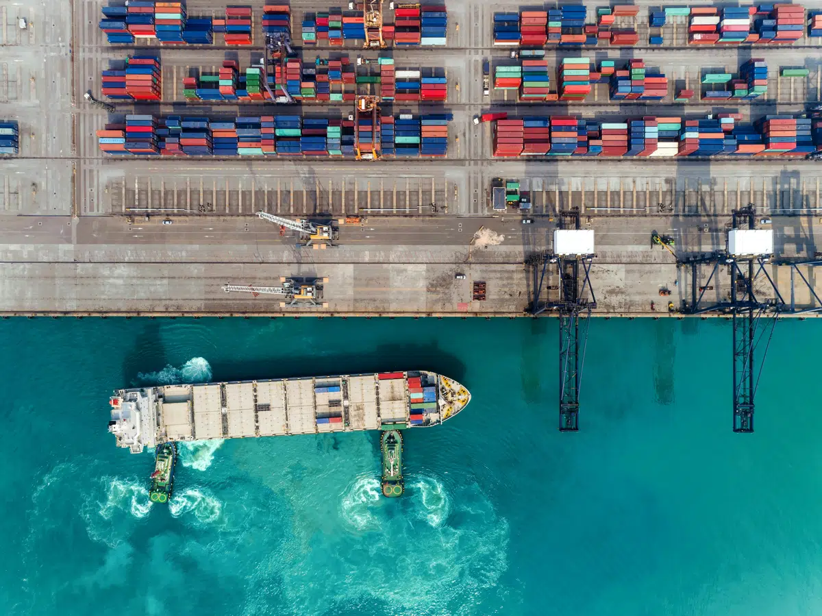 Aerial view of a vessel working a container terminal